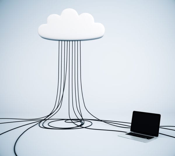 Cloud CMMS concept illustrated by computer cables attaching from a laptop to a cloud. This represents the decision that must be made between an on-premise vs. cloud-based CMMS.