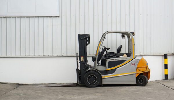 A forklift used to handle materials at an industrial warehouse.