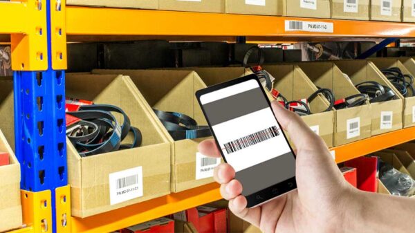 Person scanning an inventory barcode using a rugged mobile device.