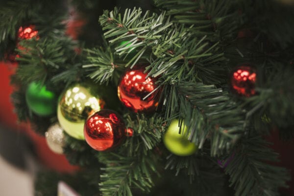 Ornaments on a Christmas tree on display during the holidays at work.