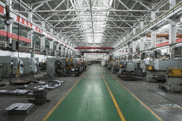 View of assets including machinery, equipment, from inside the production facility, which is itself an asset.