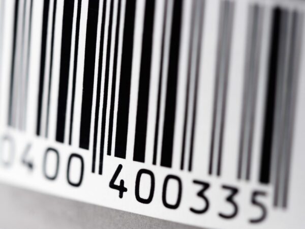 A close up of a barcode that can be used on assets and scanned with a scanner.