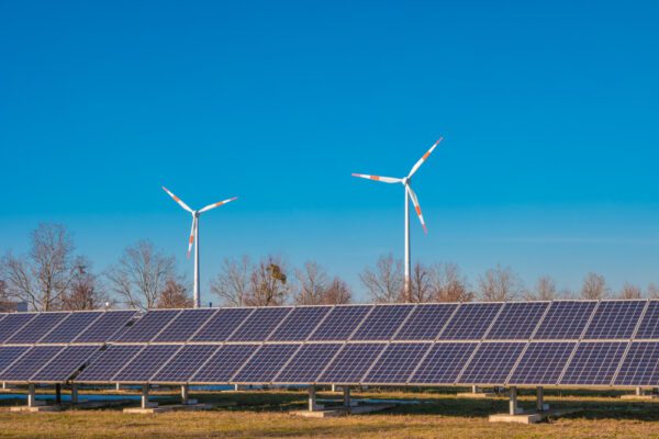 Solar panels and wind turbines used to provide power to a building