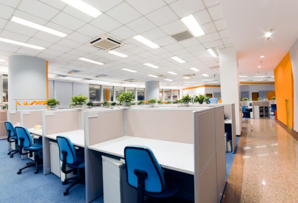 High angle view of a building office space including desk cubicles and chairs