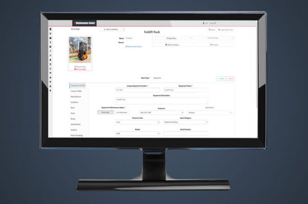 FTMaintenance Select CMMS software displayed on a computer monitor against a dark blue background