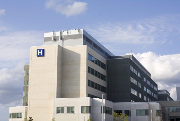 Modern hospital building exterior representing healthcare facilities