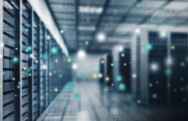 Medium shot of servers hosting CMMS data with data overlaid. 