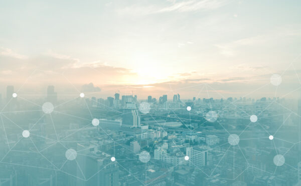A network overlaid on a aerial view of a city to represent assets located across a wide geographical region.